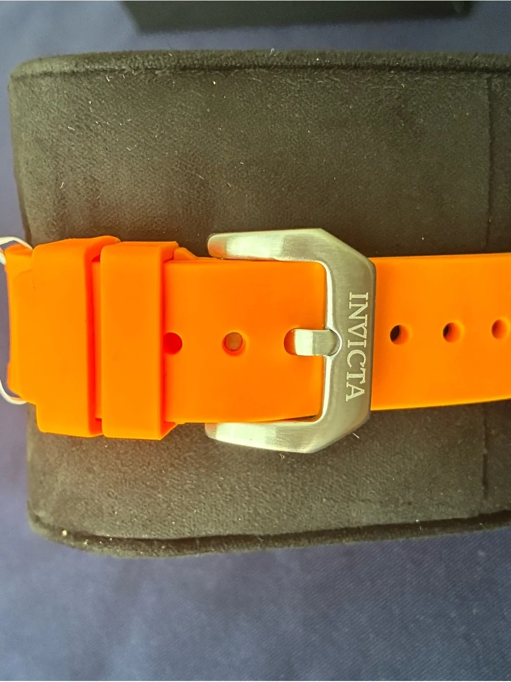 Invicta chronograph visible